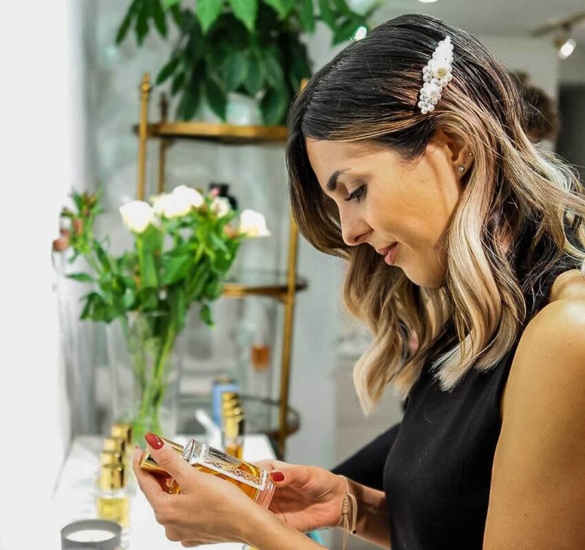 Image of a women choosing a perfume