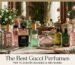 A luxurious display on a marble vanity featuring five distinct numbered bottles of Gucci perfume, including Gucci Guilty, Bloom, and others, with fresh flowers and mirrors in the background. The text at the bottom reads, "The Best Gucci Perfumes: TOP 10 SCENTS RANKED & REVIEWED.