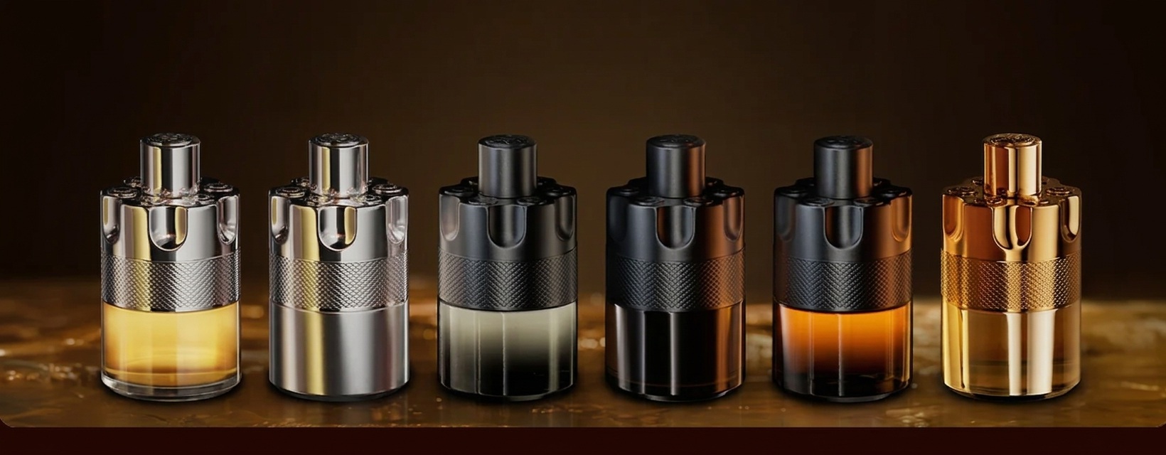 Lineup of six Azzaro Wanted perfume bottles with signature revolver cylinder caps in silver, matte black, and gold finishes displayed on a dark surface.